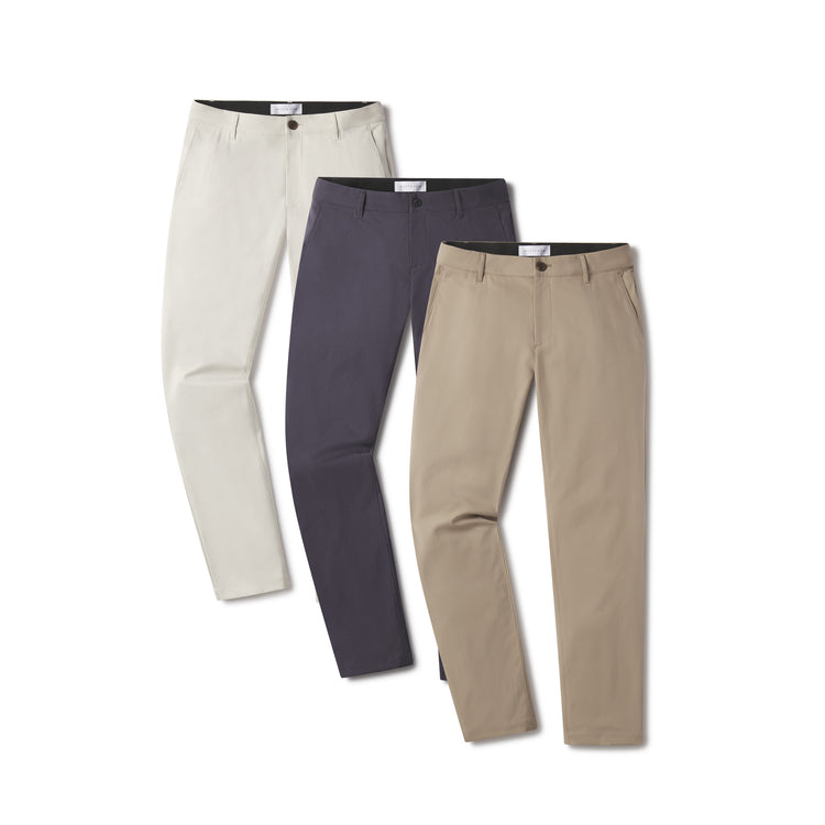 Men wearing Stone/Granite/Khaki 5 Pocket Travel Pants 3-Pack