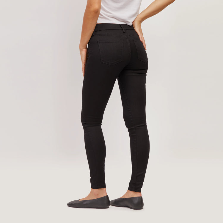 Women wearing Black High Rise Skinny Bond Jeans
