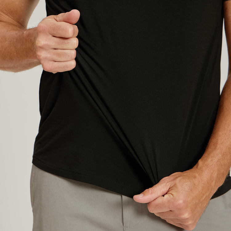 Men wearing Black Luxe Performance Polo