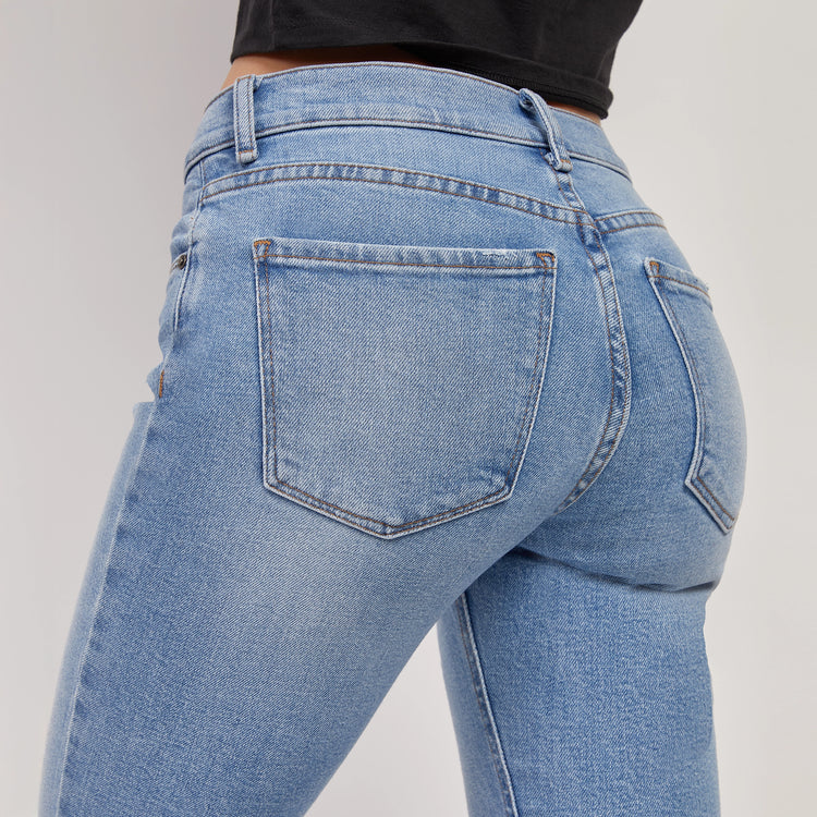 Women wearing Light Blue Mid Rise Slim Straight Hubert Jeans