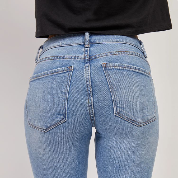 Women wearing Light Blue Mid Rise Slim Straight Hubert Jeans