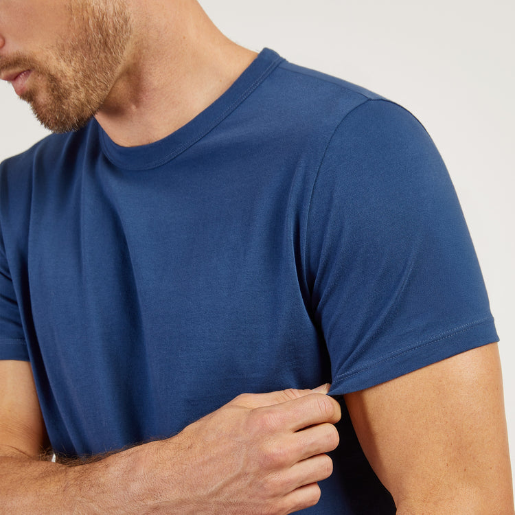 Men wearing Baltic Blue Curved Hem Driggs Tee