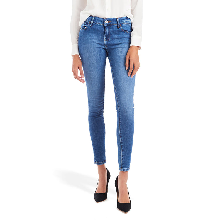 Women wearing Light/Medium Blue Mid Rise Skinny Beekman Jeans