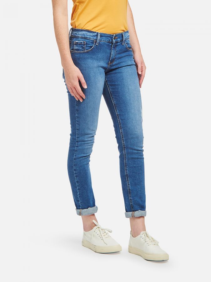 Women wearing Light/Medium Blue Mid Rise Slim Straight Ridge Jeans