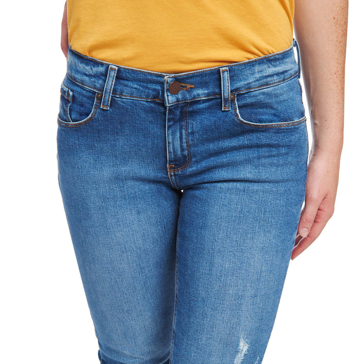 Women wearing Light/Medium Blue Mid Rise Slim Straight Ridge Jeans