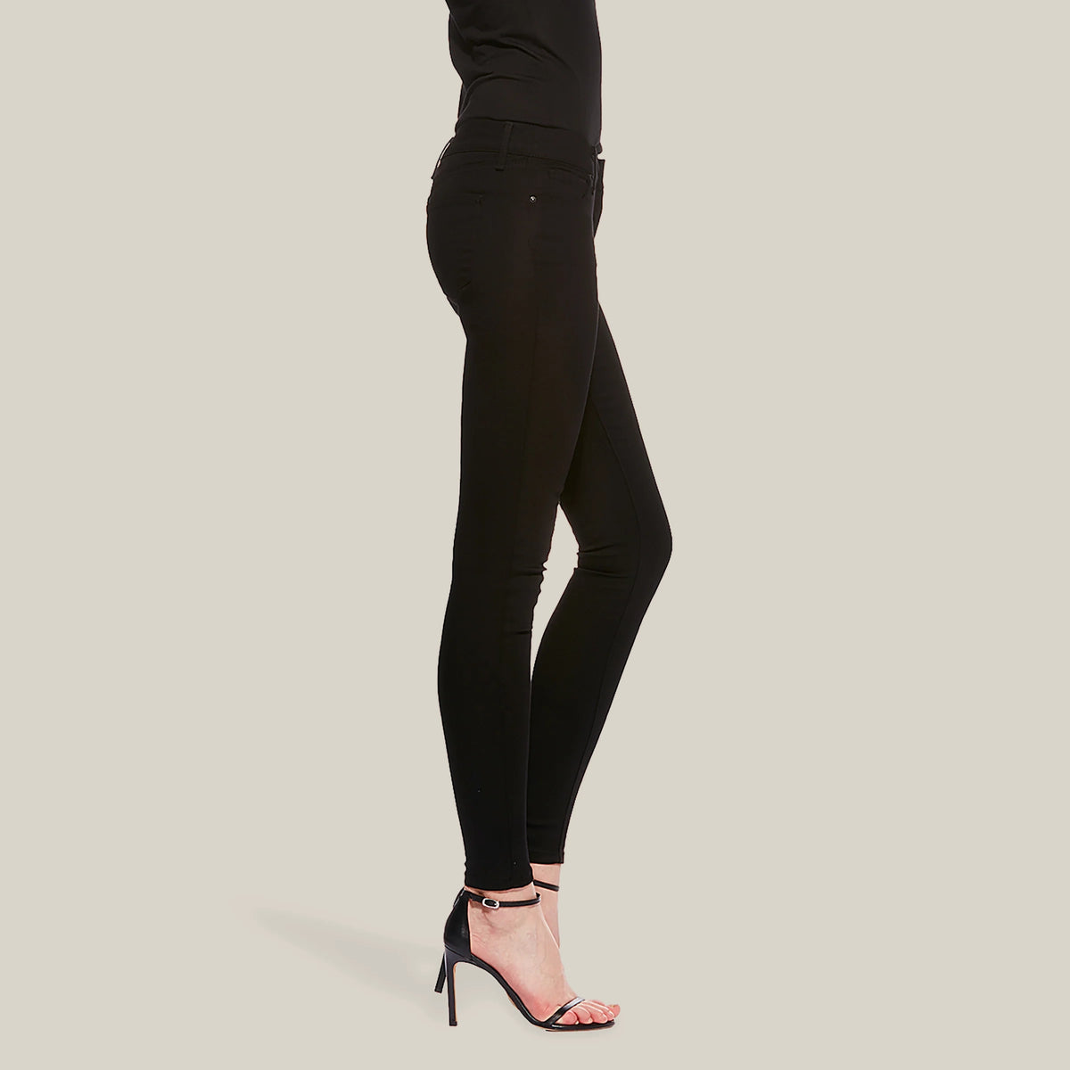 Women wearing Negro Mid Rise Skinny Bond Jeans
