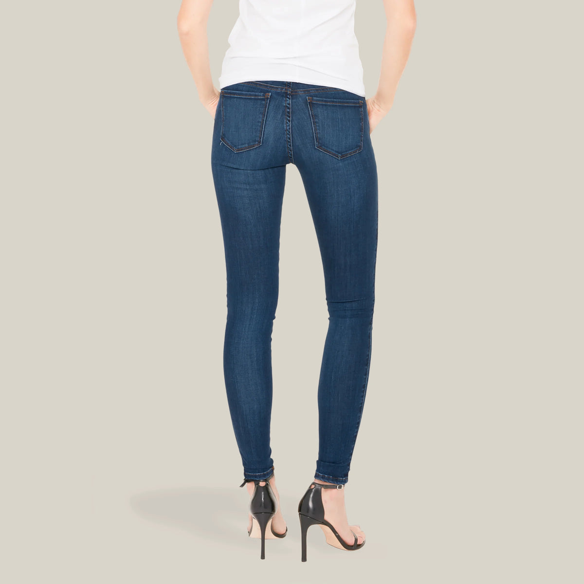 Women wearing Medium Blue Jane Mid Rise Skinny Jeans