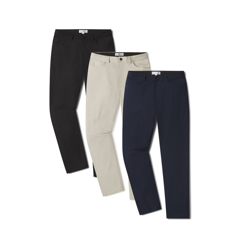 Men wearing Navy/Stone/Black 5 Pocket Travel Pants 3-Pack pants