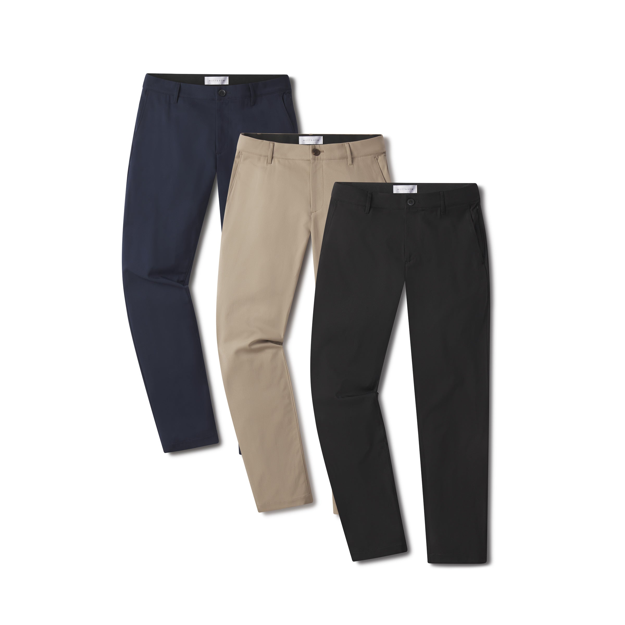  wearing Khaki/Black/Navy Slim Tech Pants 3-Pack pants