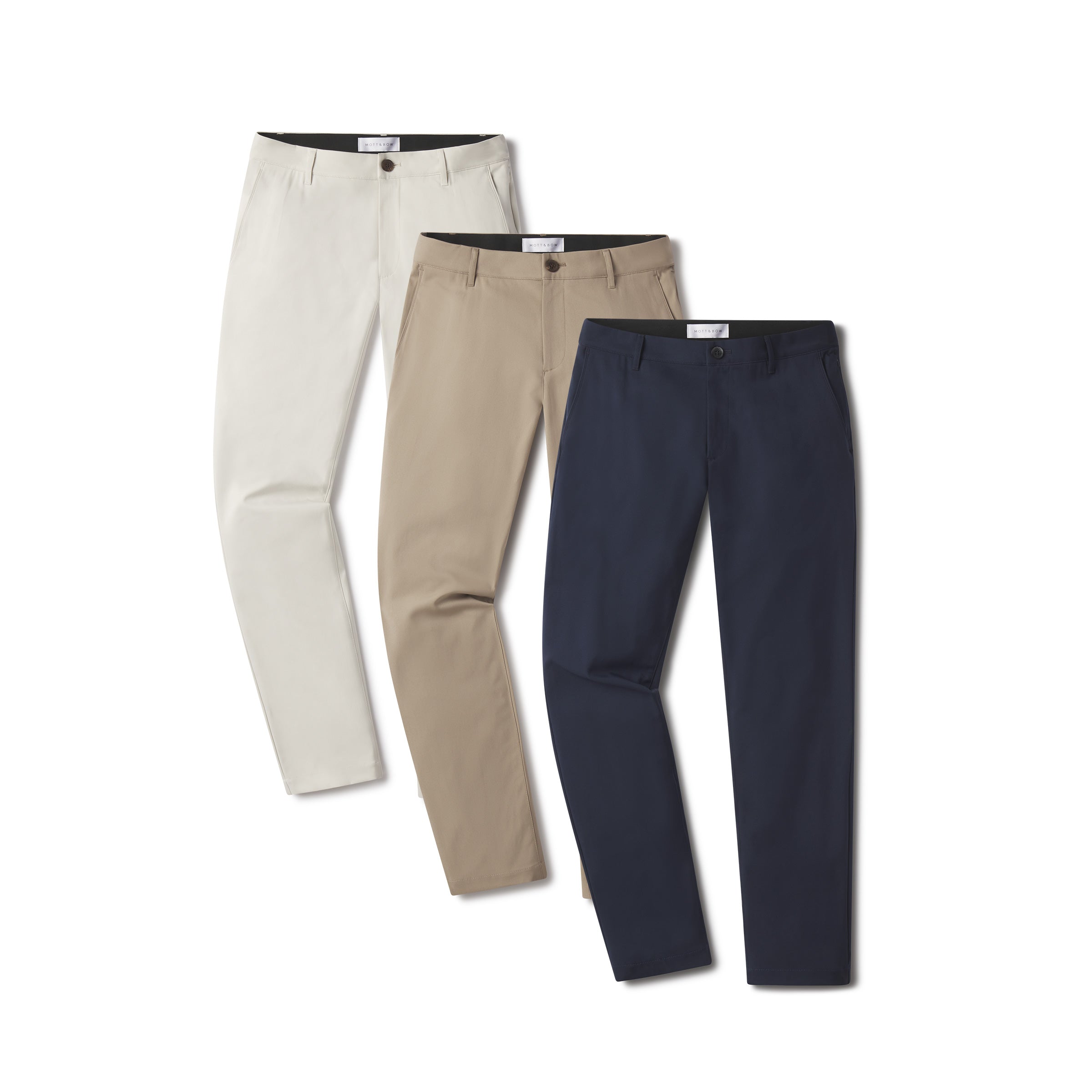  wearing Navy/Stone/Khaki Slim Tech Pants 3-Pack pants