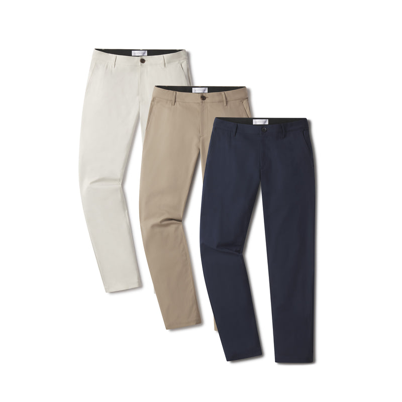  wearing Navy/Stone/Khaki Slim Tech Pants 3-Pack pants