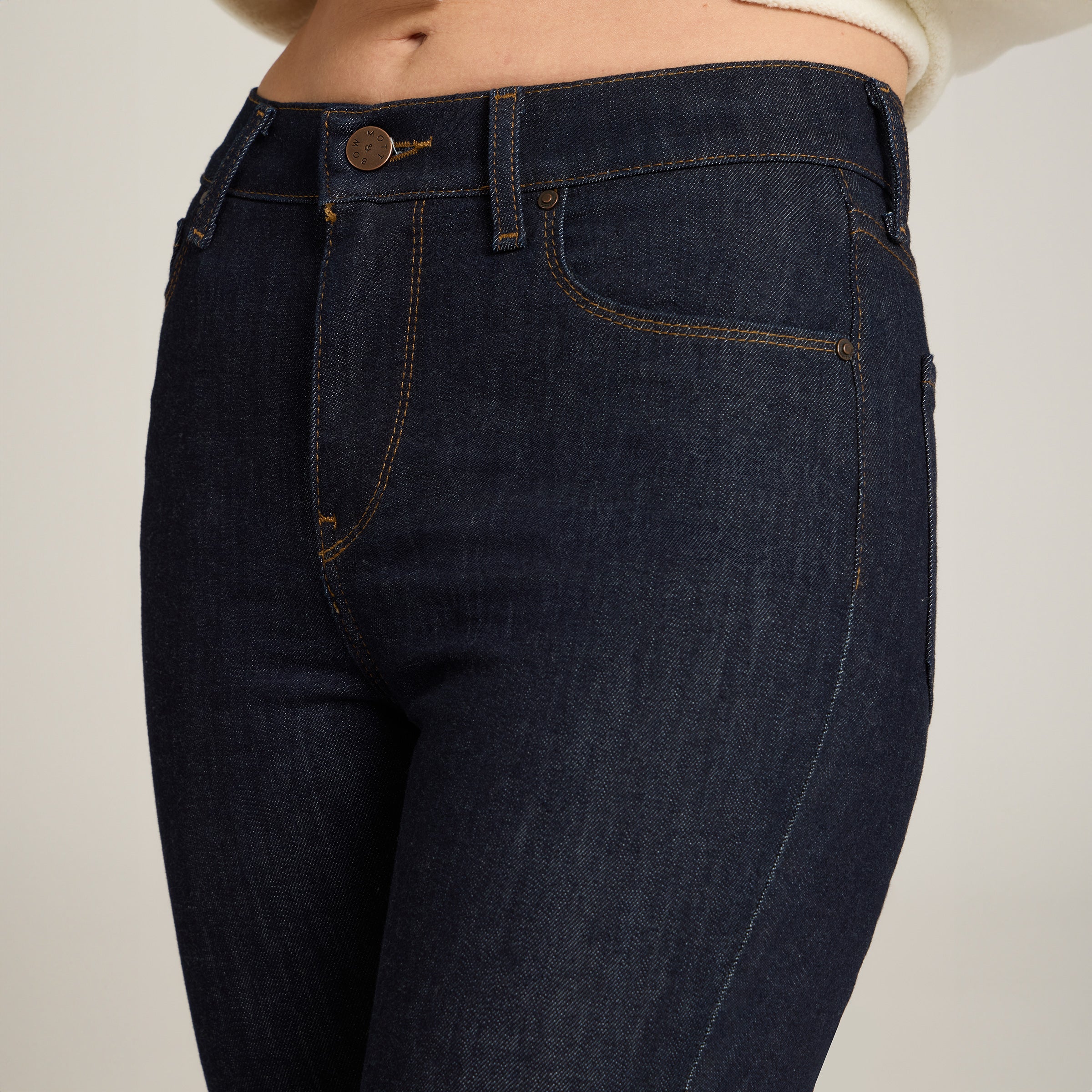 Women wearing Midnight High Rise Skinny Logan Jeans