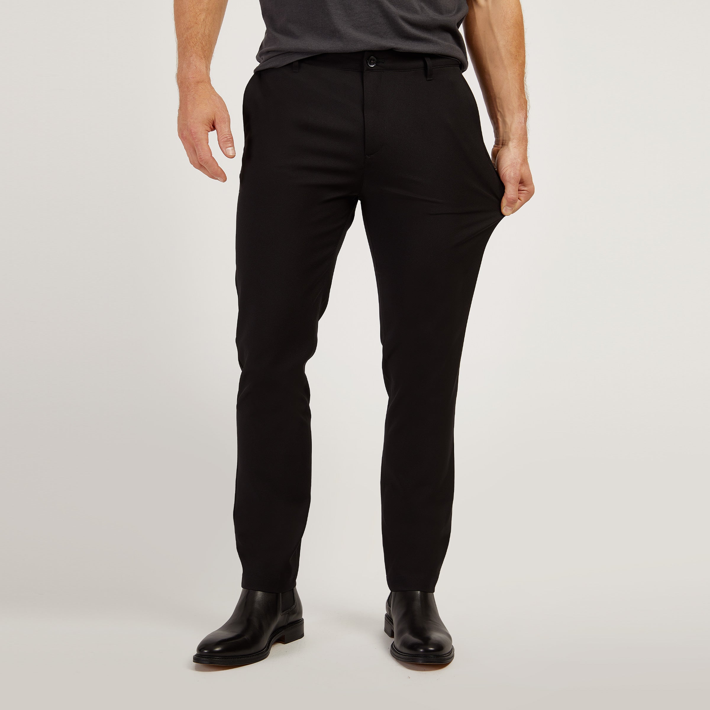 Men wearing Black Slim Tech Pants