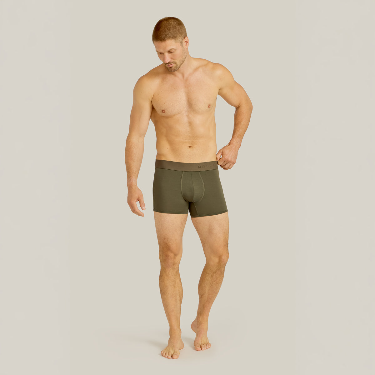 Men wearing Dark Moss Second Skin Trunk