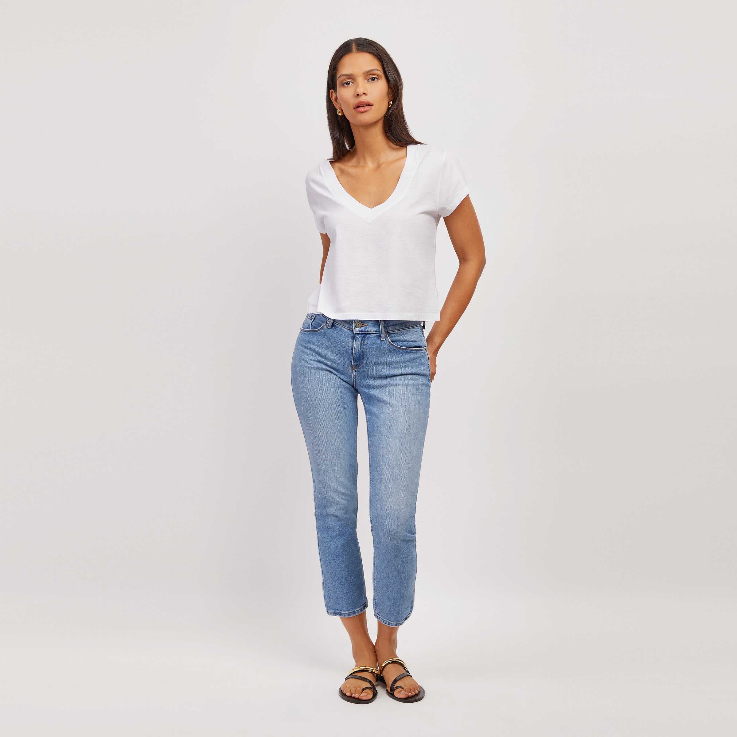 Women wearing Medium Blue Mid Rise Slim Straight Hubert Jeans