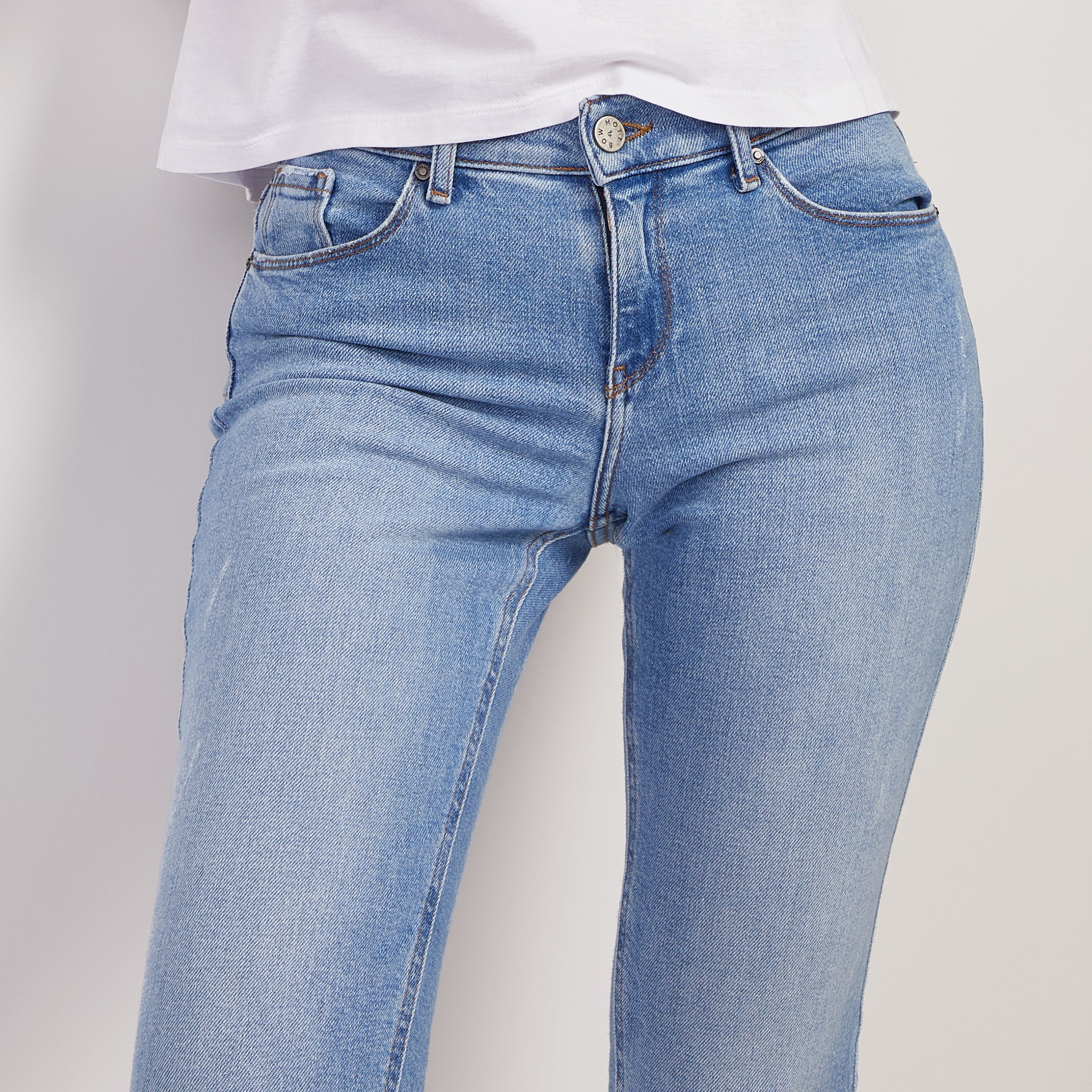 Women wearing Medium Blue Mid Rise Slim Straight Hubert Jeans