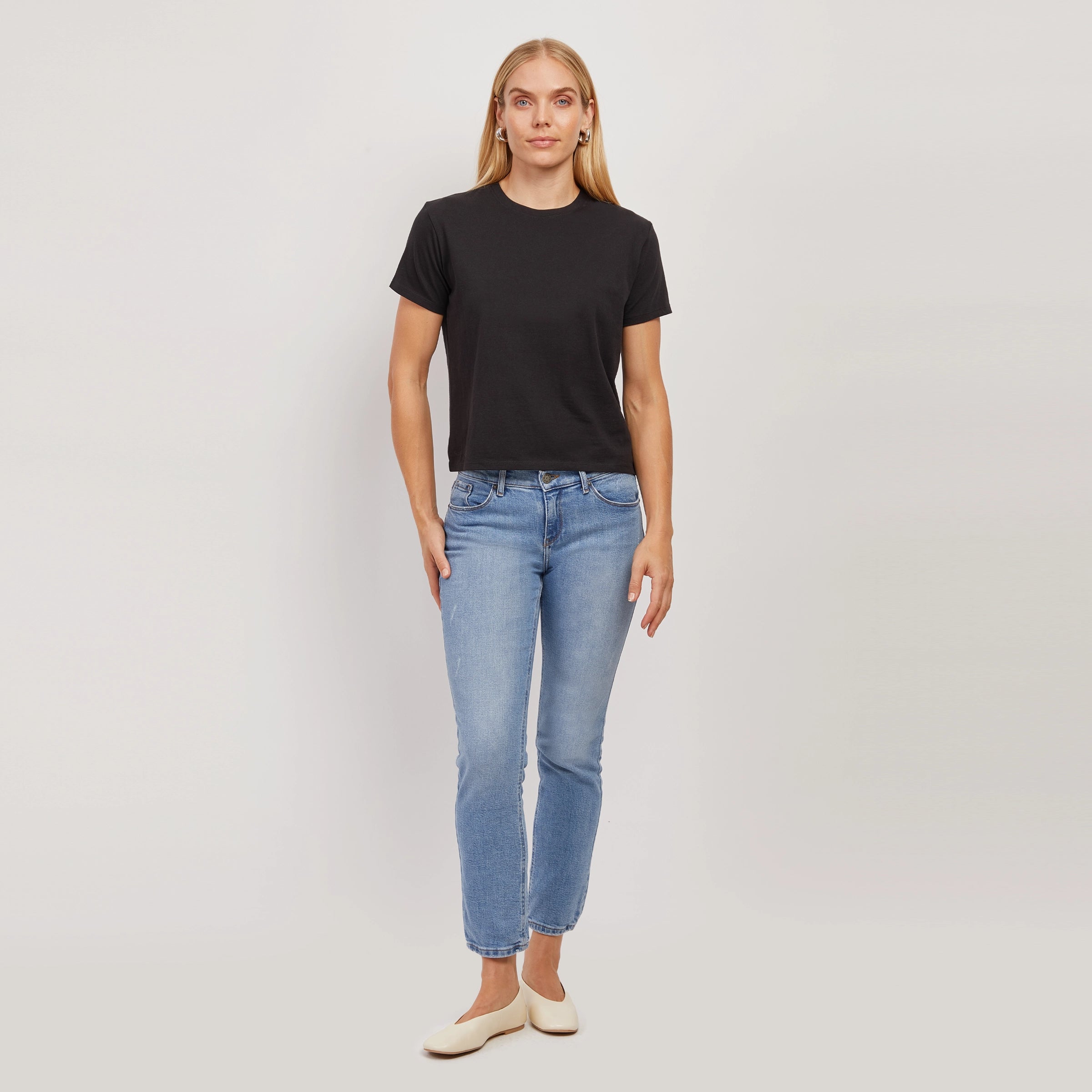 Women wearing Light Blue Mid Rise Slim Straight Hubert Jeans