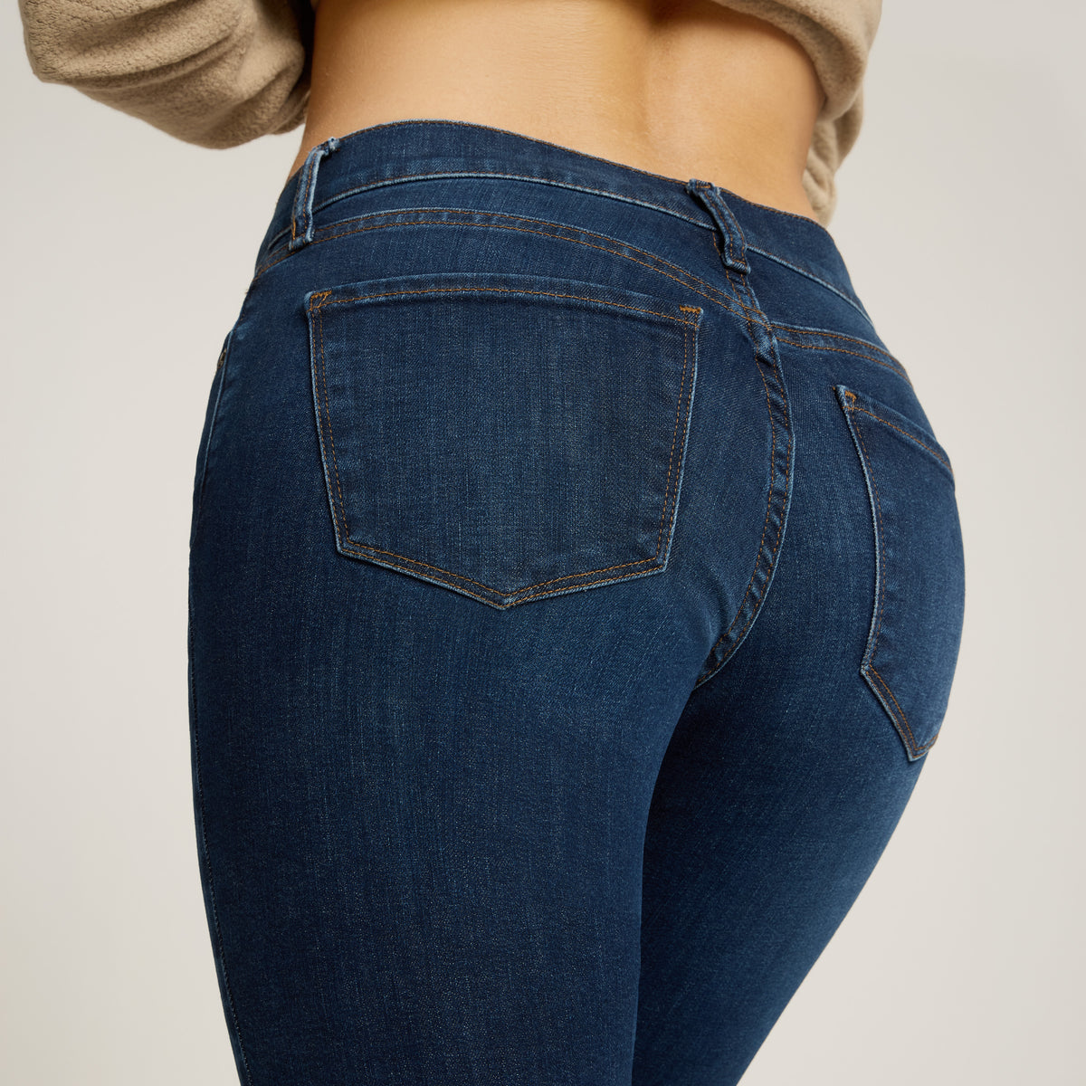 Women wearing Dark Blue Logan Mid Rise Slim Straight Jeans