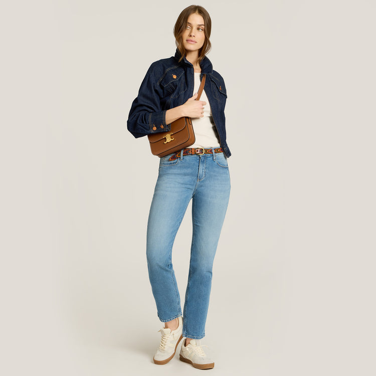 Women wearing Washed Out Blue Mid Rise Slim Straight Ridge Jeans