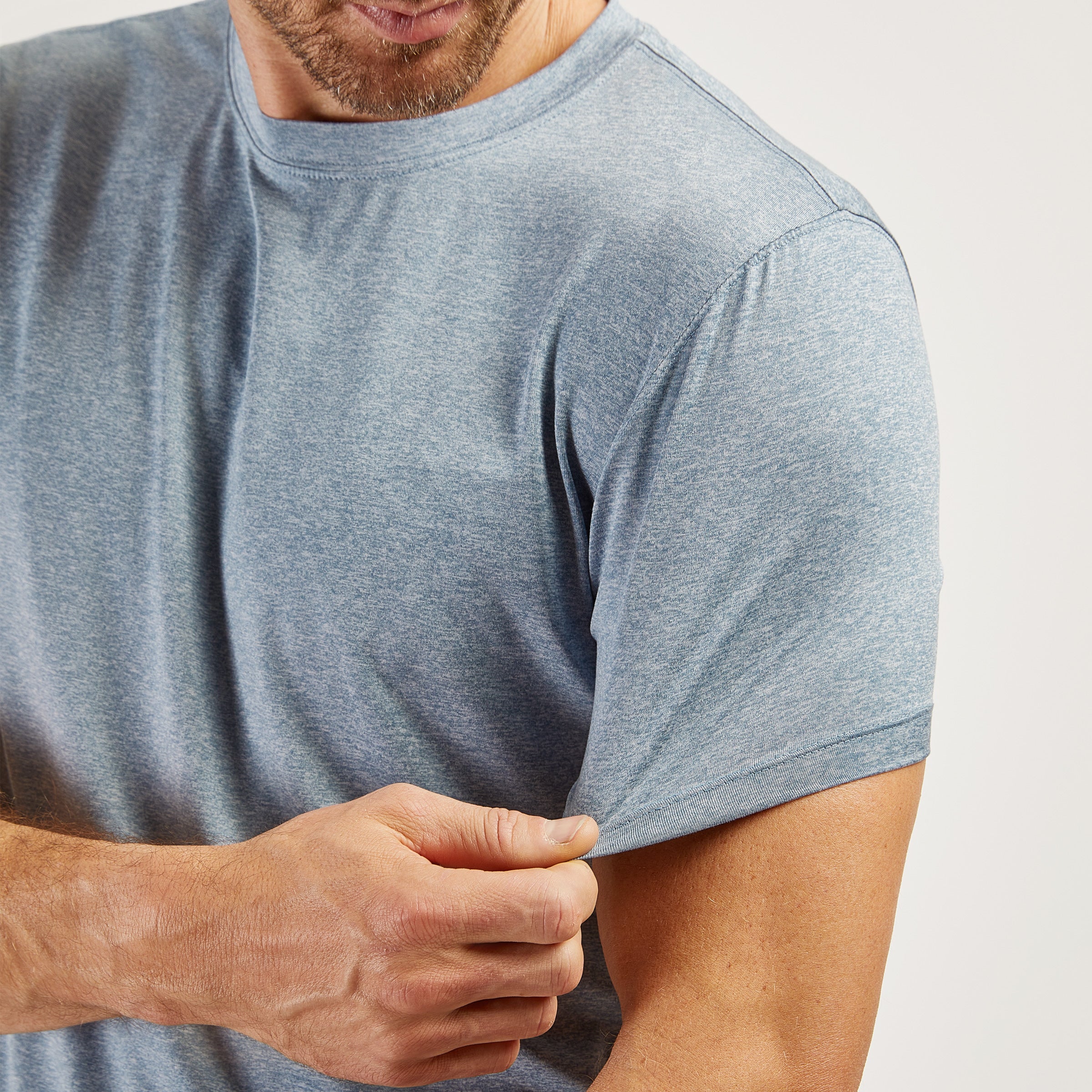 Men wearing Sky Blue Heather Tech Tee