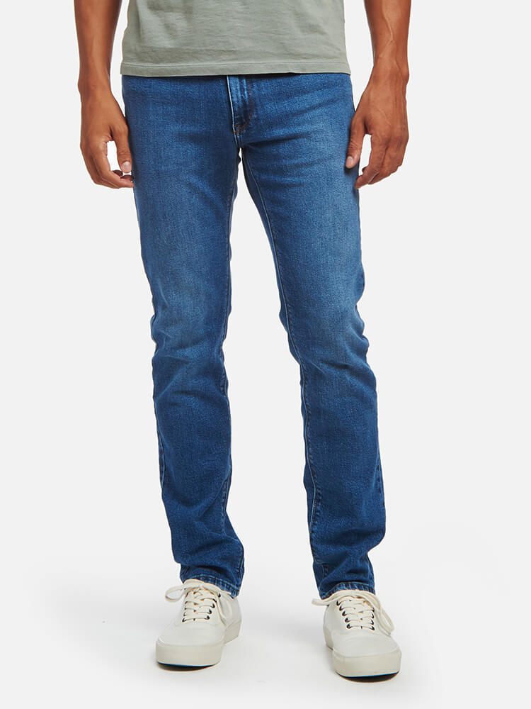  wearing Medium Blue Slim Hubert Jeans - Pre Order